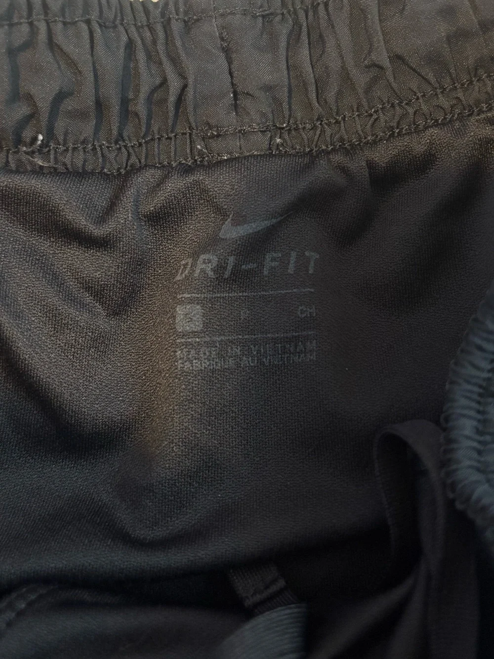 Black Nike running shorts